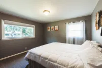 Centrally located 4Bedroom, 5 BEDs & 2Bath; Beautiful backyard