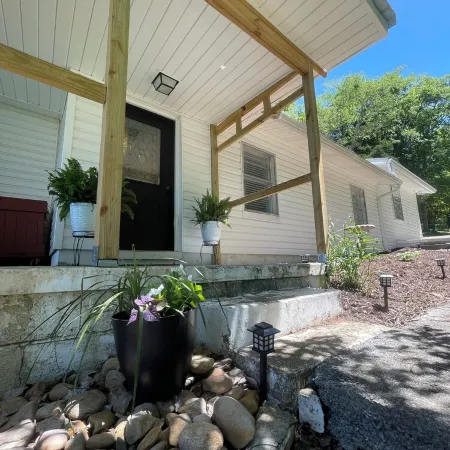 Lakefront home on the main channel w/ beautiful view and a boat ramp next door!