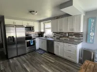 COVE DISTRICT HOUSE WITH VIEW OF CEDAR POINT