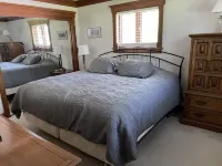 Waterfront Chalet with expansive views of lake & mountains.