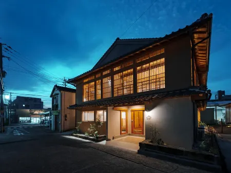 Ikeda Ryokan Отели рядом с достопримечательностью «Nishinoomote port offshore Breakwater north Lighthouse»