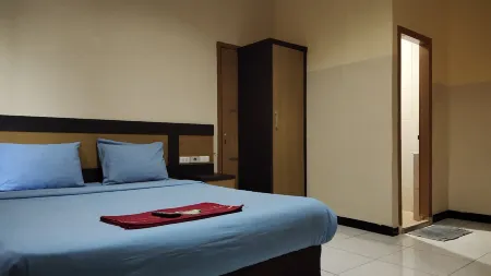 De' Premium Hotel Kartini Отели рядом с достопримечательностью «Benteng Kuto Besak»