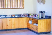 Pousada Obah Village - servizio colazione
