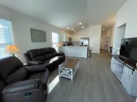 Spacious Kitchen and Cozy Patio - Charming Modern Getaway