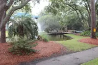 Pools, Tennis Courts and Scenic Balcony Views - Charming Coastal Getaway