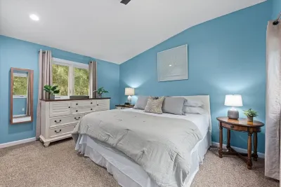 Charming Townhouse with Golf Course Views - Cozy Escape with Sunroom