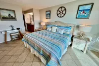 Full Oceanfront View and Access to Pool and Hot Tub - Stunning Coastal Retreat