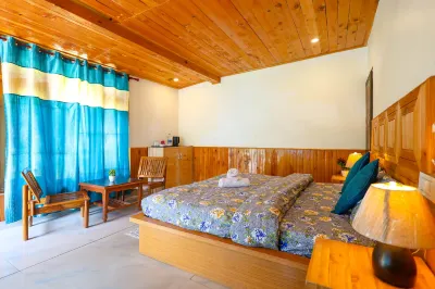 Moksha Woodhouse Hotels near Kullu Camp
