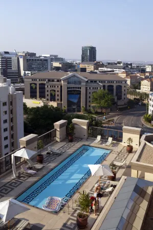 The Michelangelo Towers Отели рядом с достопримечательностью «Sandton Skye»