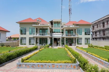 The City Block Apartment Отели в г. Бужумбуре