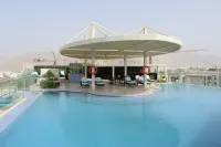 Grand Millennium Muscat connected to Muscat Grand Mall - Pools
