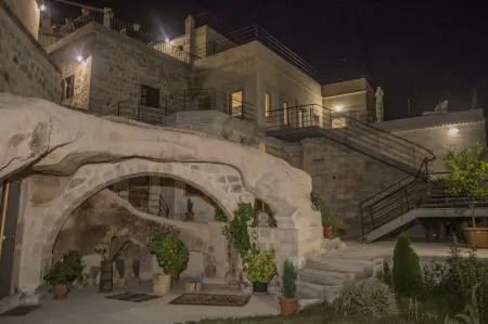 Helike Cave Suites Отели в г. Tekelli Mahallesi