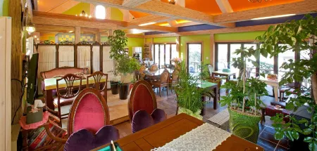 Art in Tiara Отели рядом с достопримечательностью «Озеро Бомуньо»