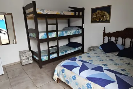 Suítes Praiamar Vista Linda Bertioga Отели в г. Бертиога