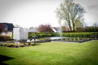 Holiday Suites de Haan Hotels near Amour