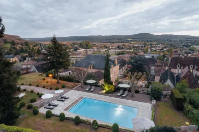 HOTEL L'ABBAYE Hôtels à : Castels