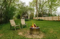 Rustic Riverside A-Frame Retreat: Secluded Charm.