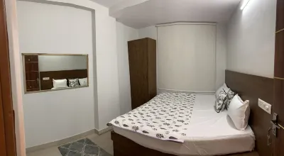 Neewara Residency Apartment. This apartment has 2BHK with Kitchen and balcony Hotels in 