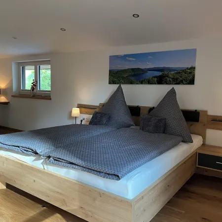 Quietly located modern vacation accommodation with a view of the Edersee National Park Отели в г. Фёль