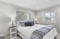 Beach Retreat w/ Sundeck, Golf Cart & Bikes Bungalow House by Avantstay