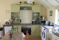 2 bedroom cottage, with far reaching views of the garden and open countryside.