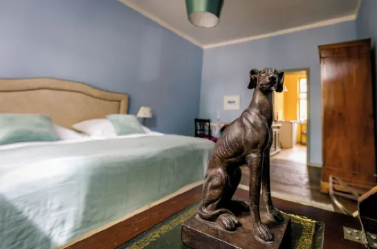 Spend the night in a monument with a view of the trees in the middle of the old town