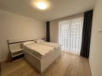 Stylish 2-Bedroom Sarajevo Retreat: Private Baths & Panoramic Views