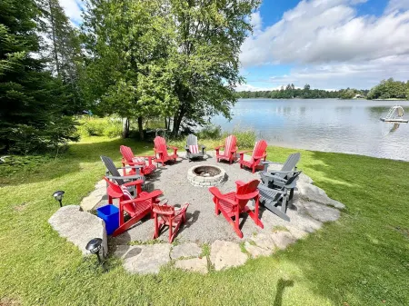 Lakeside Bliss Tait Lake – Cozy 3 Bed Cottage with Hot Tub & Private Waterfront!