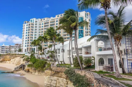 Beachfront condo at beautiful Cupecoy Beach Club.  2 bedroom, 3 bath, amenities!