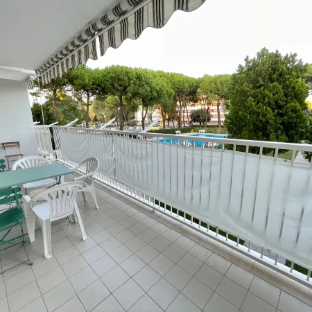 Welcoming Flat with Pool View Balcony