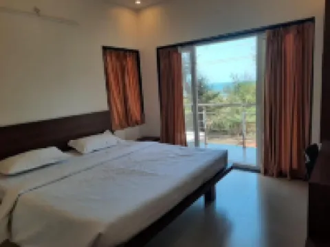 Raapan Beach Resort Hoteles en Malvan