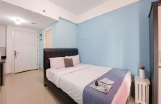 Basic Studio Apartment near KRL Station at Poris 88 By Travelio