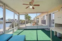 4 bedrooms home located on the deep water canal 13630 Garris Dr. Hudson Fl 34667