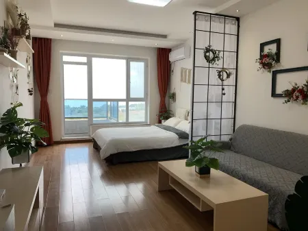 Xijuren Apartment (Changjiang Road) Отели рядом с достопримечательностью «Thumb Plaza»