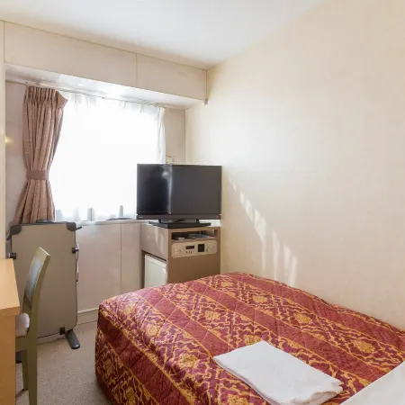 Business Hotel Palace Takamatsu Отели рядом с достопримечательностью «Башня Символ»