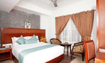 Hotel Olive International - Housity