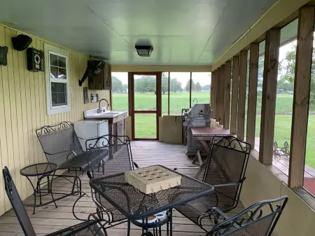 "My Playhouse" Enjoy the country views from the wrap around screened porch