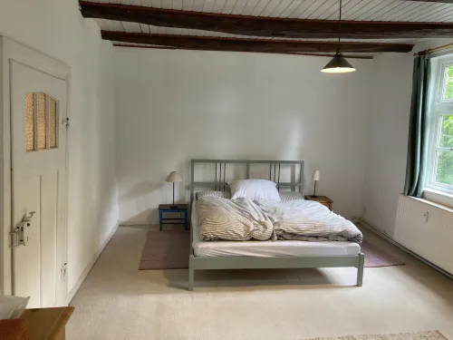 Stylish and bright apartment in a listed half-timbered house with a large garden