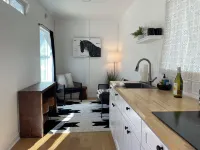 Cozy cabin and contemporary container home on one property! Pets welcome!