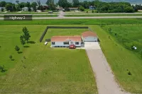 Three bedroom home on a large lot with a lake view