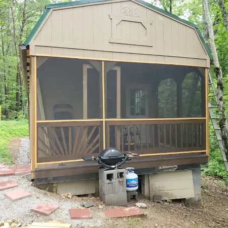 Pet friendly cottage on 17 acre Lake front property with dock and kayak access