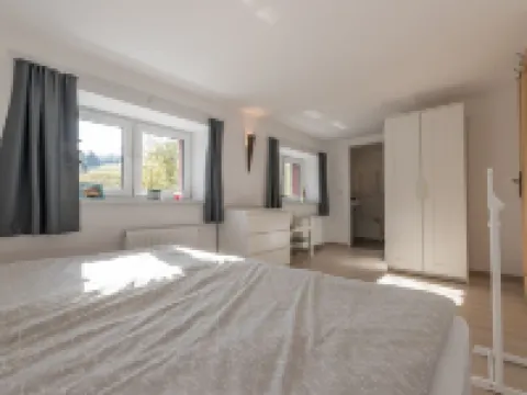 Apartment in a top location with sauna and roof lounge for families and active vacationers Hotels in Waltersdorf