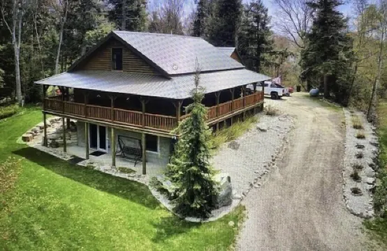 Log Home Located on Lake Muskallonge