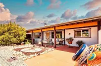 Stunning 3-Bed/2-Bath Villa with Hot Tub, Pool, & Garden in Joshua Tree