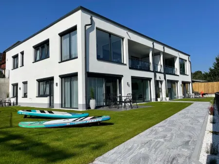 Apartments -Saaldorf WG 2, terrace and view of the reservoir