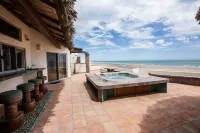 Beach Front Luxury Living & Spectacular Deck with heated Spa