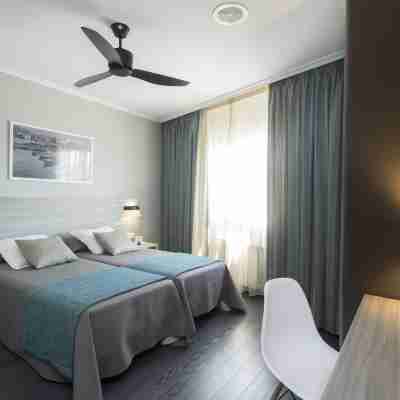 HOTEL COMBARRO Rooms