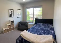 Brand New modern 3 story home with fenced in yard! Outdoor hot tub and firepit