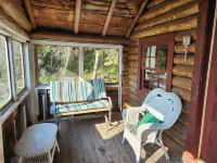 Rustic Log Cabin #8 on Crow Lake at Bull Moose Lodge. Family and pet friendly