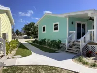 Cozy private green studio cottage on water free floating dock at your doorstep